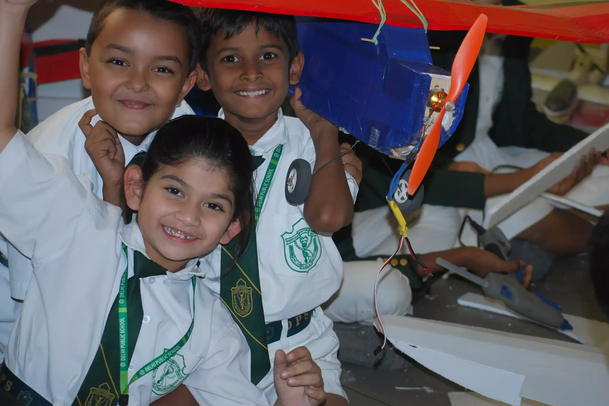 Student with her friends working on a project.
