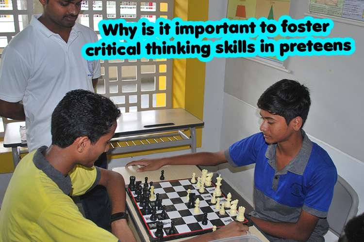 A group of young men playing chess to foster critical thinking skills in preteens