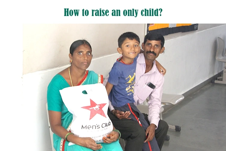 Family with an only child holding a school bag.
