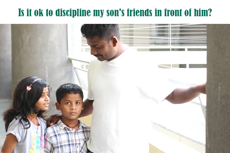 Father speaking with children, addressing the question of disciplining a child's friends in front of them