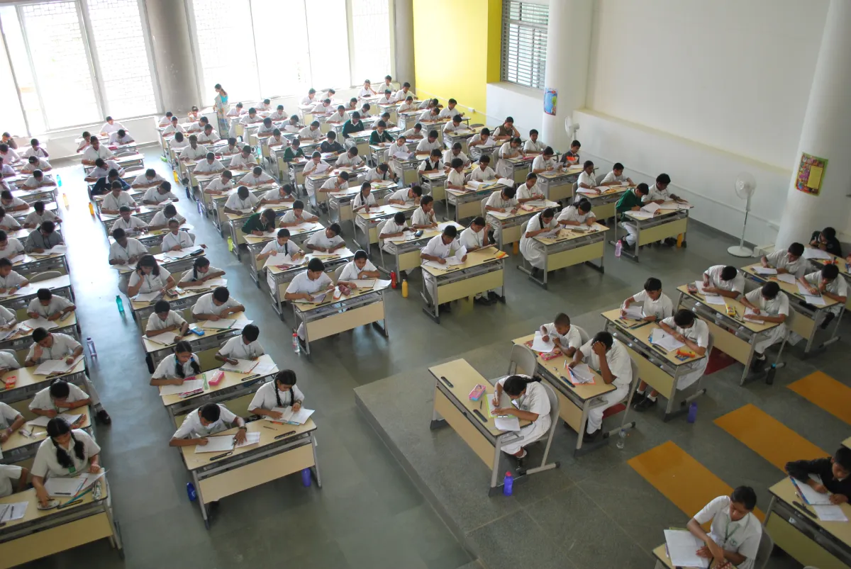 Students attending the examination in the exam hall at DPS, Warangal