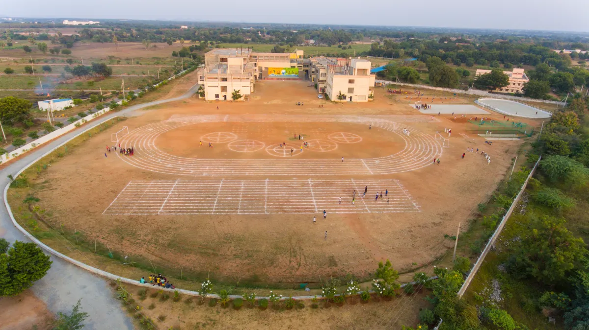 Large playground and field view of Delhi Public School, Warangal
