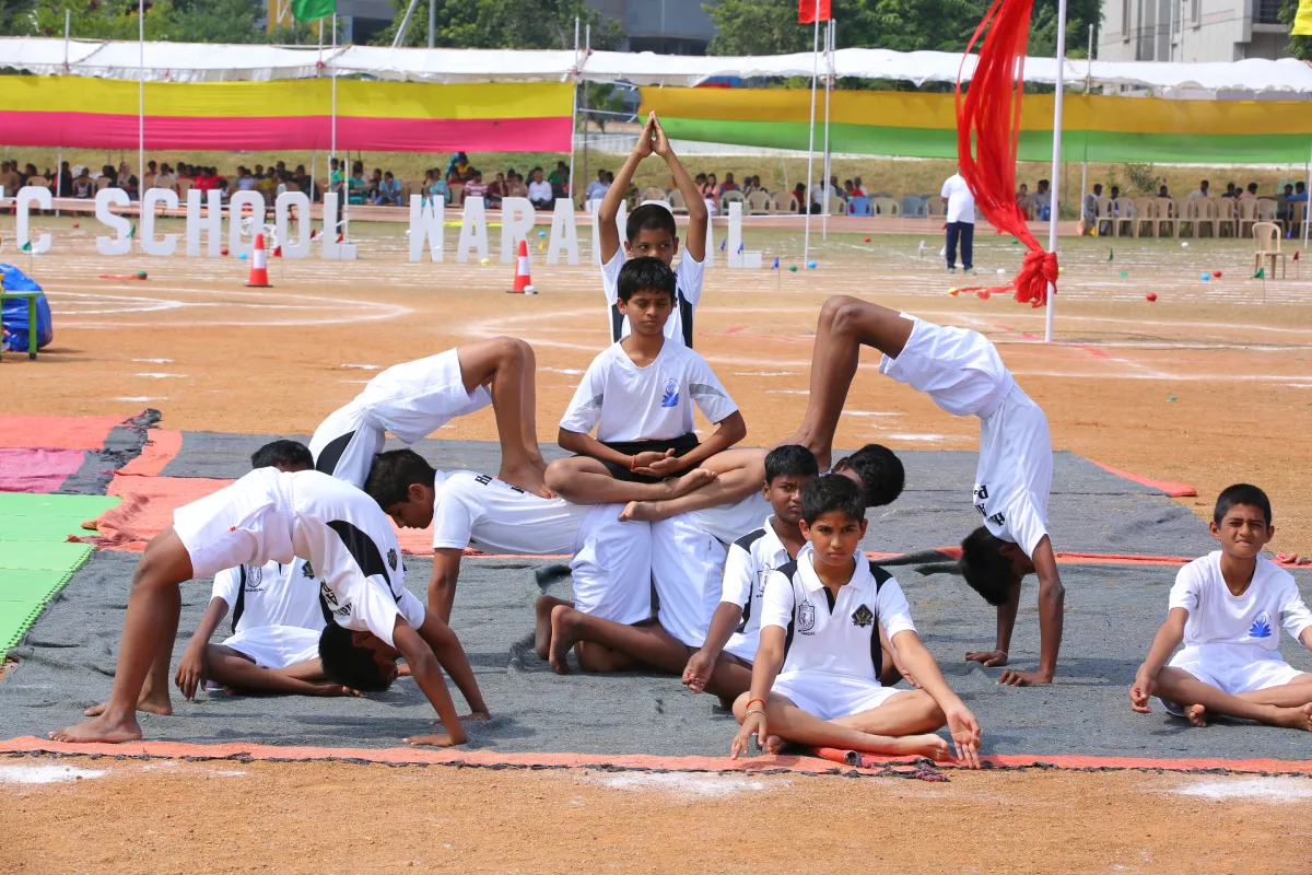 During Sports Day celebration, students of DPS, Warangal performed pyramid formation in white and black colour sports dress.