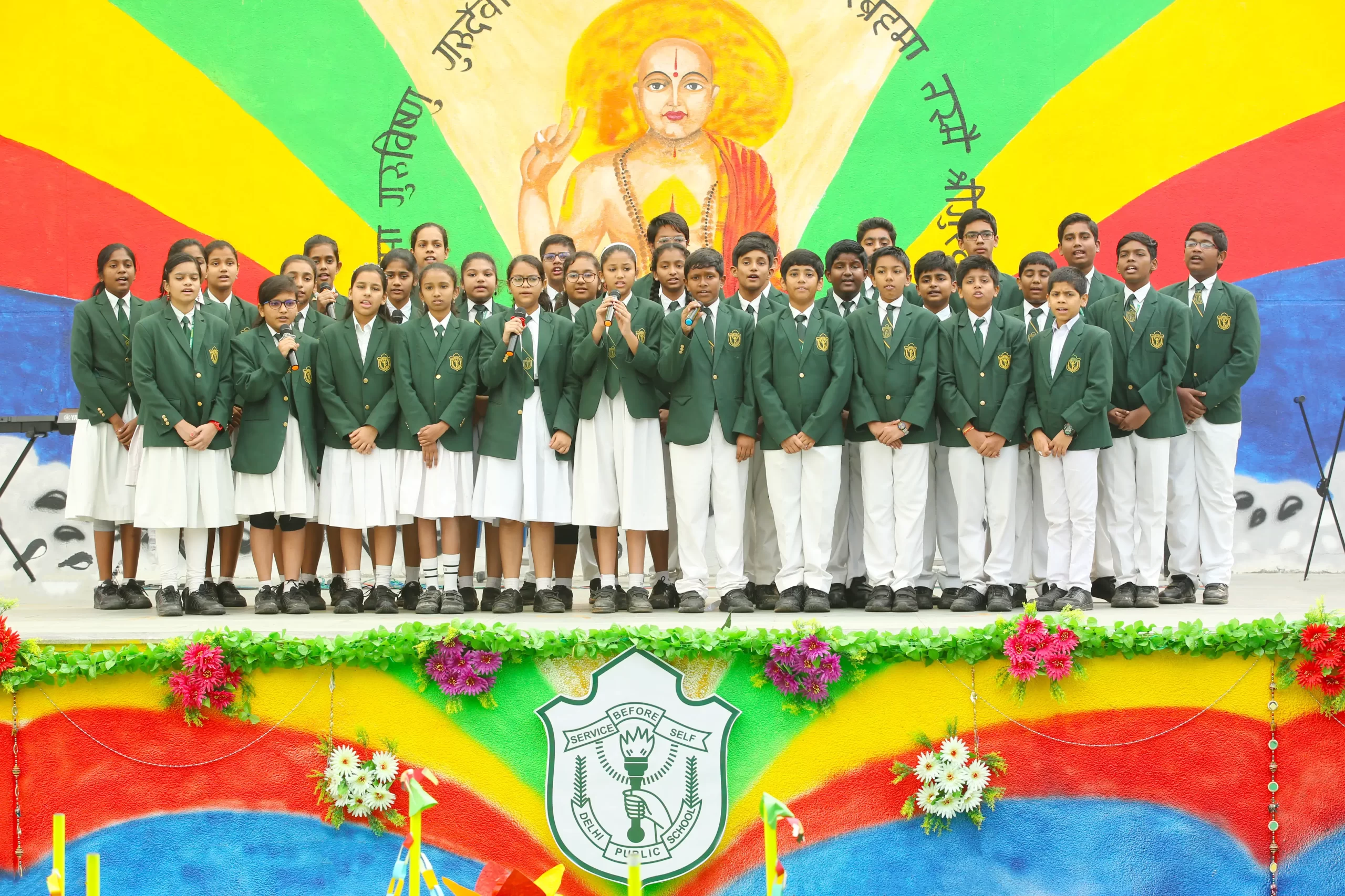 Students of Delhi Public School, Warangal singing in choir on the occasion of Guru Purnima.