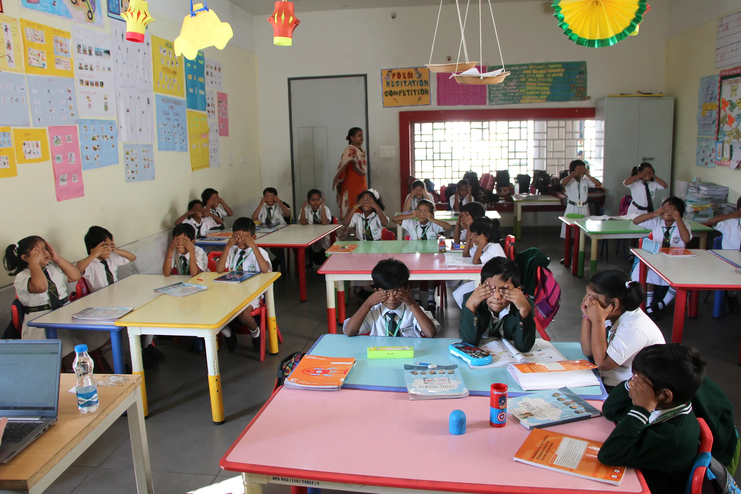Students sitting in the class with eyes closed as a part of some activity performed in DPS Warangal.
