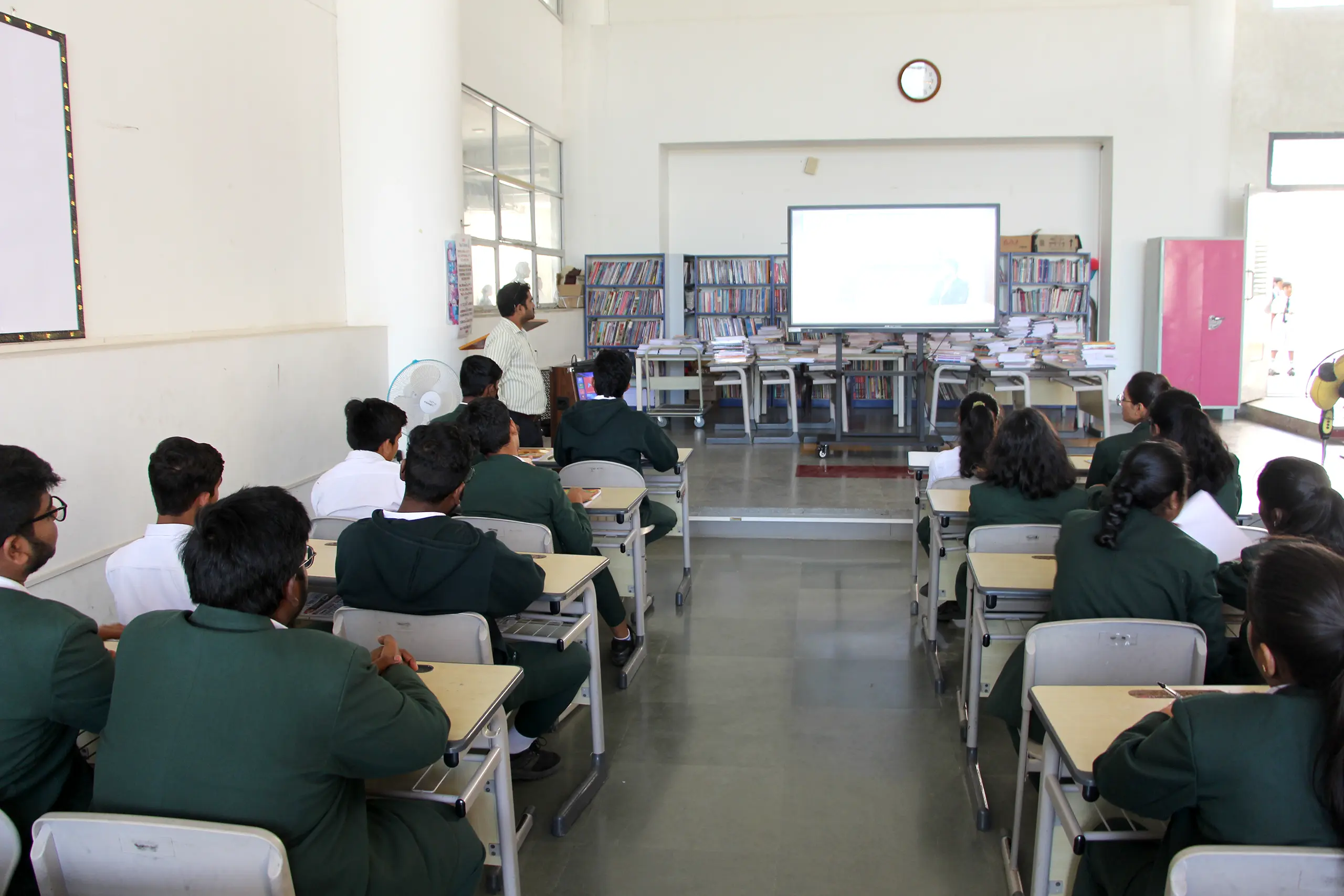 Students of DPS Warangal in school dress sitting in the activity hall and attending leadership talk session where they learnt different leadership skills.