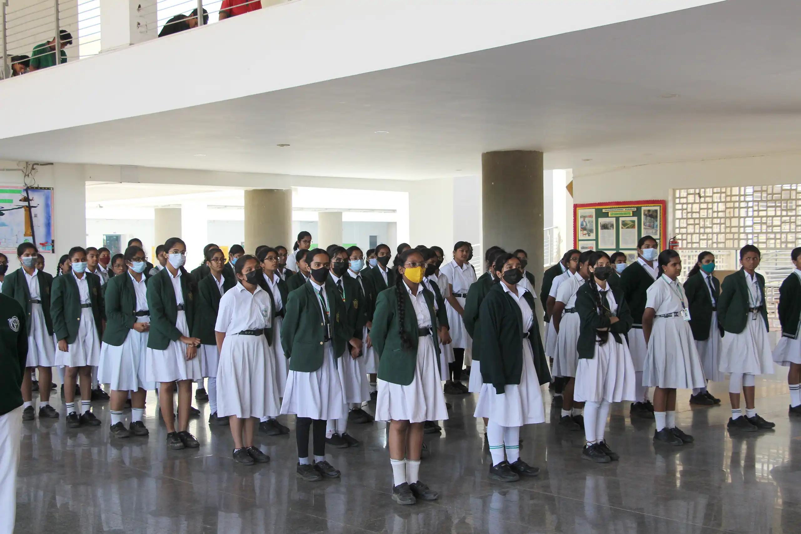 Girls of DPS Warangal in school dress assembled in activity hall for National Constitution Day Celebration.