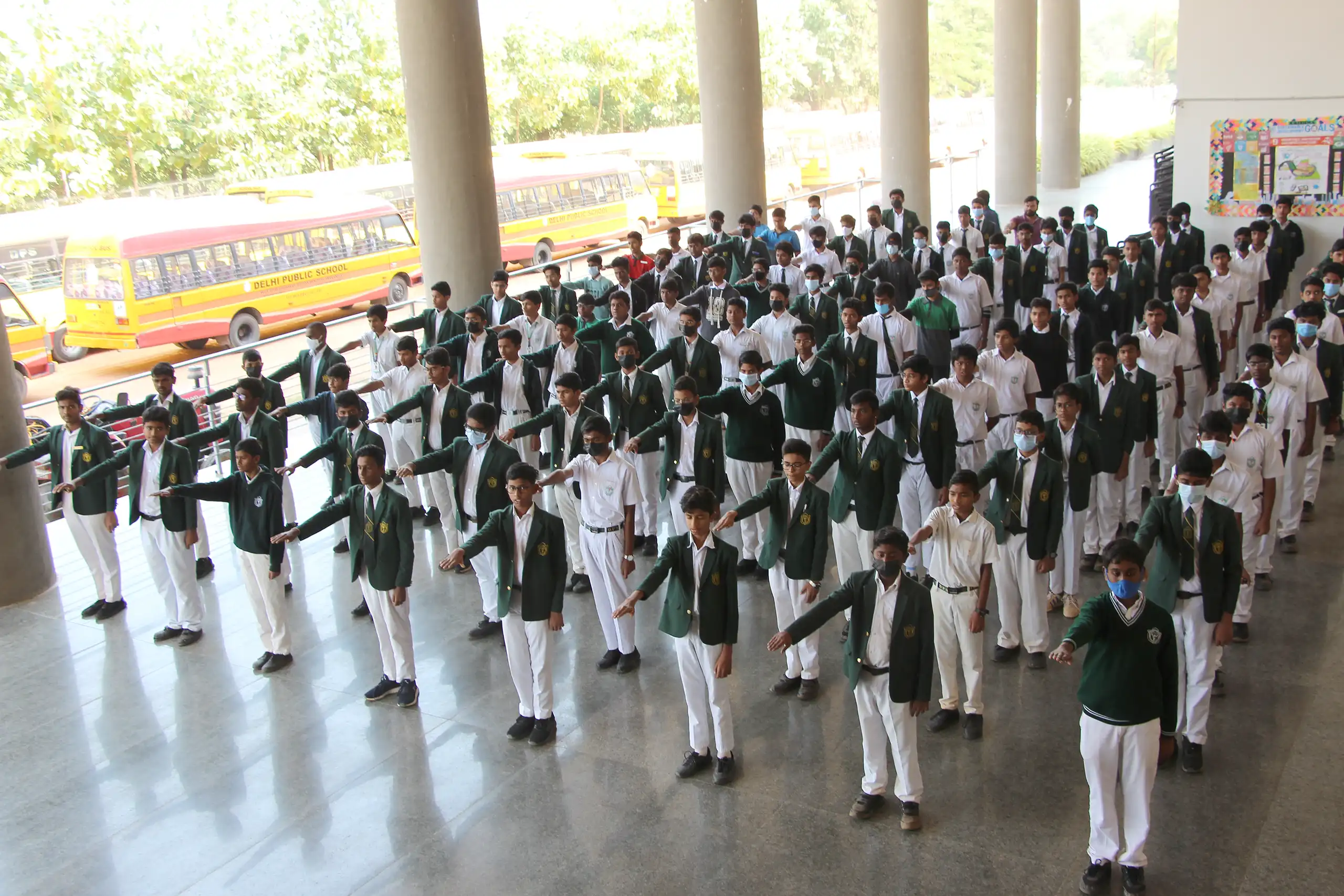 Students of DPS Warangal gathered in activity hall and taking pledge during National Constitution Day Celebration.