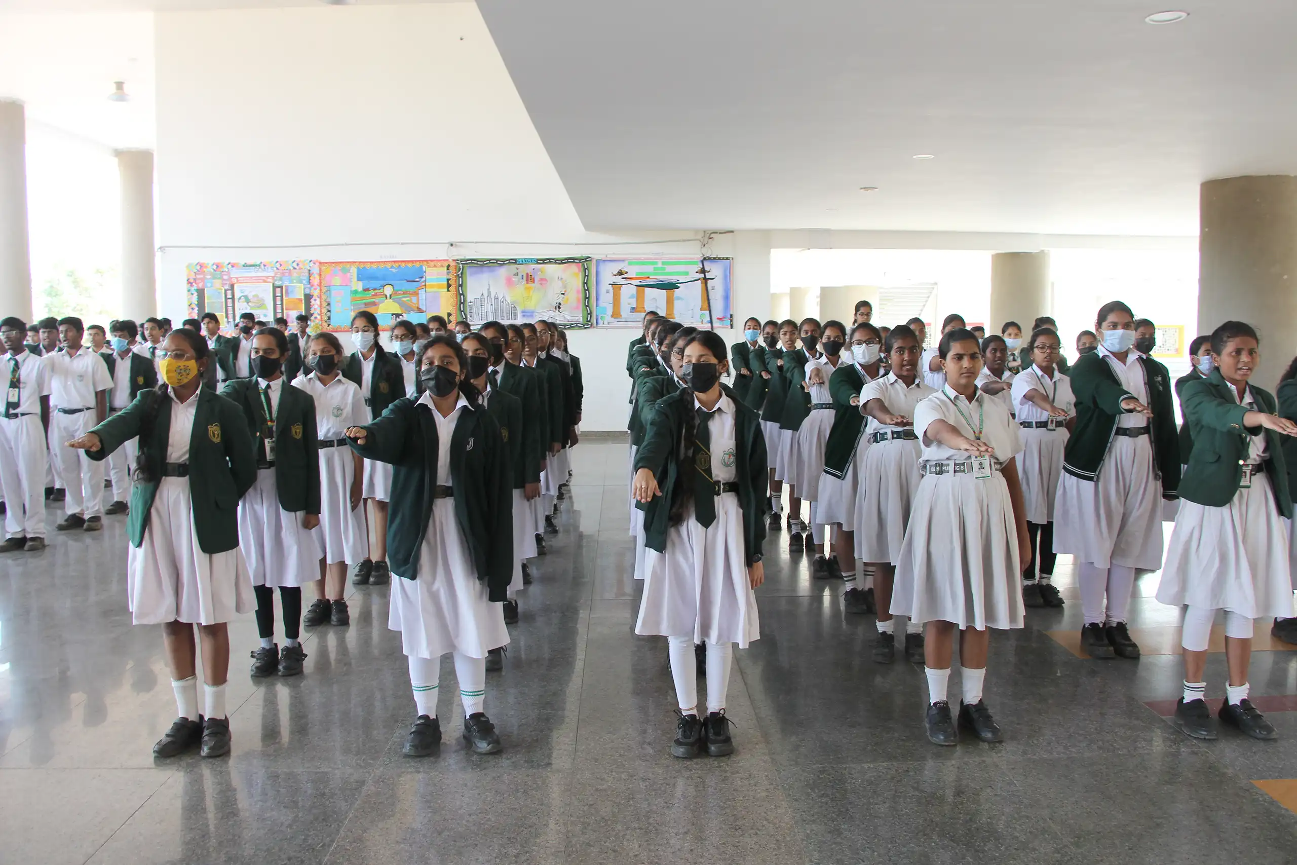 Students taking pledge together during National Constitution Day celebration at DPS Warangal.