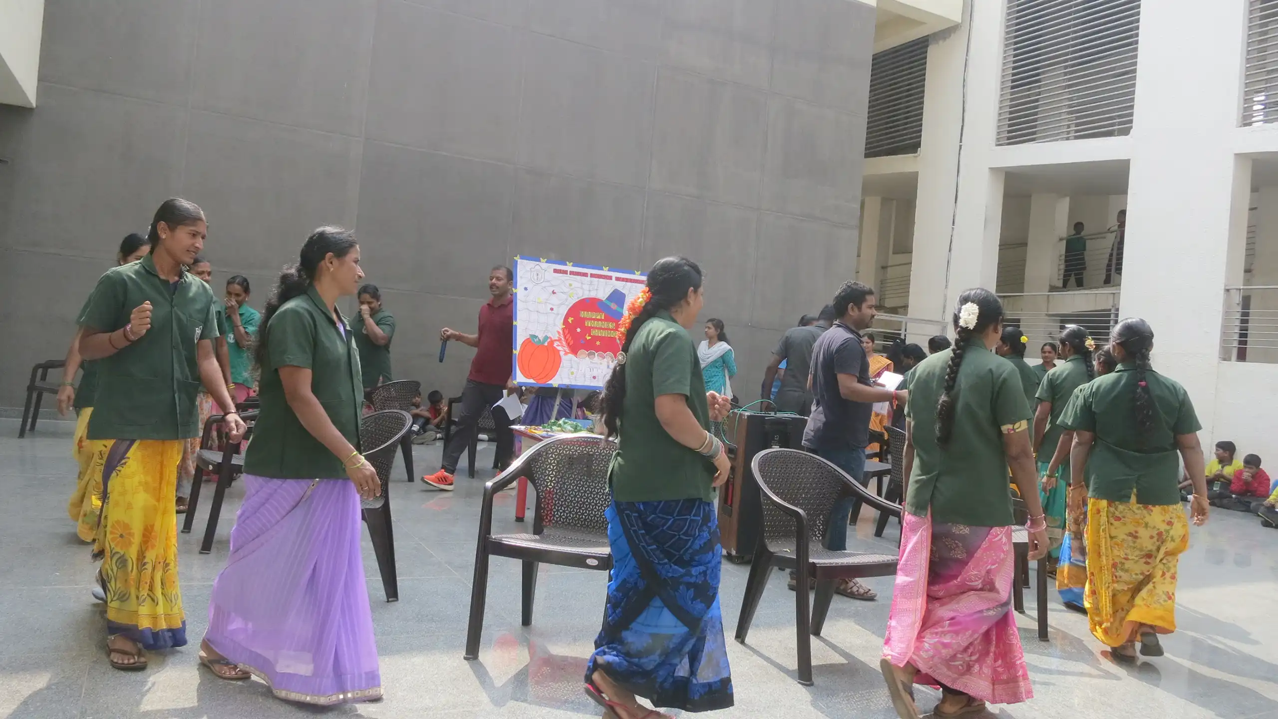 Teachers and staffs performing various activities during thanksgiving session at DPS Warangal.