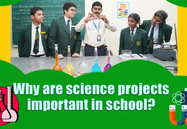 Students of DPS Warangal making science project with the help of teacher.