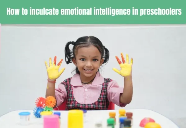 Child happily engaged in painting. Discover effective ways to instil emotional intelligence in preschoolers.