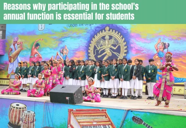 In a vibrant and lively scene, a group of school children is gathered in front of a stage, ready to showcase their talents at the school's annual function. The children are dressed in neat school uniforms, with some wearing white shirts and blue pants, while others wear blue skirts. Standing in front of a colorful banner, they eagerly await their turn to perform.