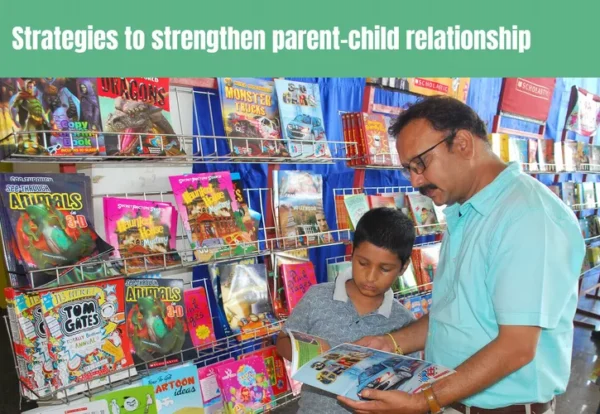 A young boy standing and choosing a book with his father, surrounded by a display of children's books. showing their strong relationship