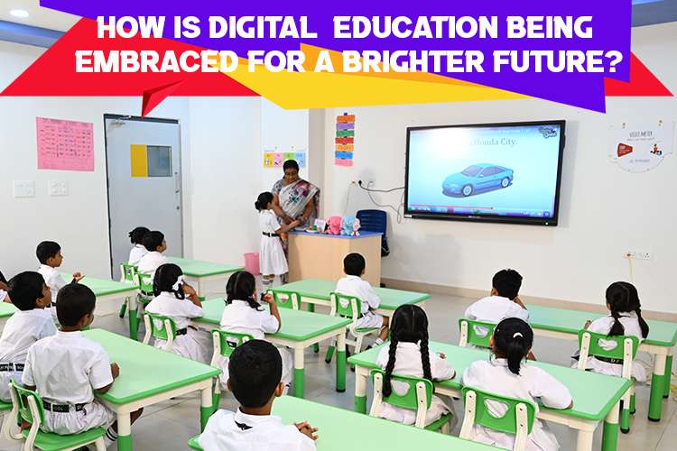 Teacher teaching in the classroom using technology, showing How is digital education being embraced for a brighter future