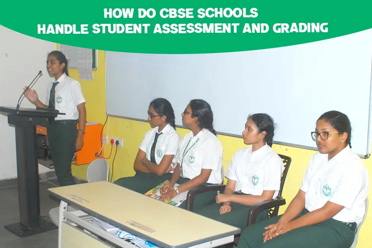 A group of girls sitting at desks in front of a whiteboard at DPS Warangal, the best residential school.