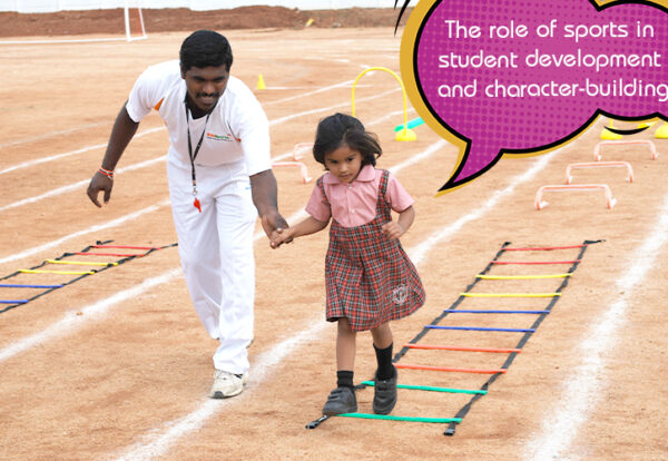a man and a little girl playing with a ladder and teaching the role of sports in life