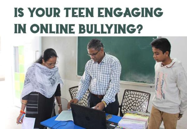 Teachers leading a class on preventing online bullying and promoting internet safety among students