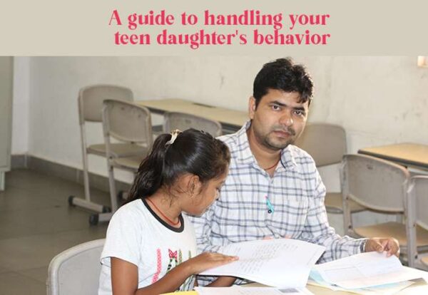A person, likely a parent, sits alongside a teenager, both engaged in studying together, showcasing the positive teen daughter's behavior.