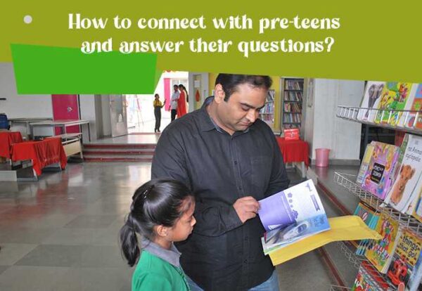 Adult and child engaged in shared learning, looking at a book together to seek answers to their questions.