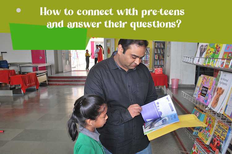 Adult and child engaged in shared learning, looking at a book together to seek answers to their questions.