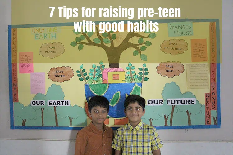 A few boys standing in front of a poster develop good habits.