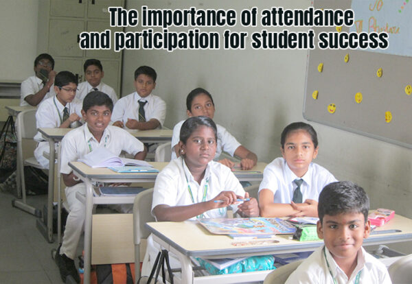 a group of children sitting at desks in a classroom showcasing the importance of attendance
