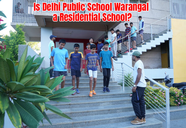 A group of DPS Warangal residential students standing on stairs