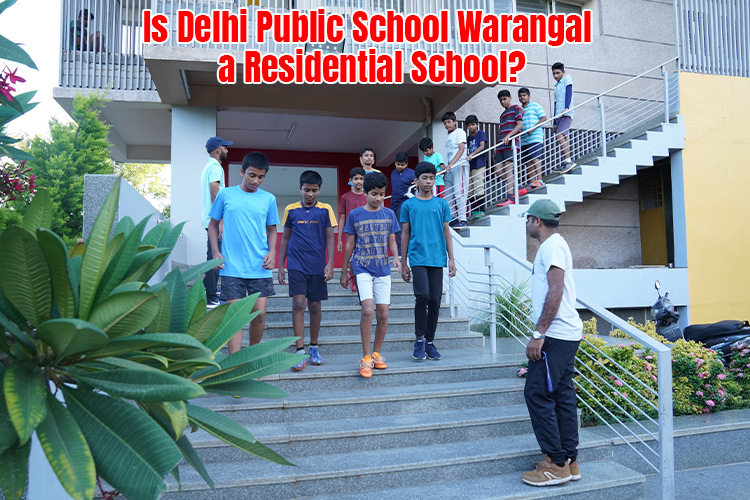 A group of DPS Warangal residential students standing on stairs