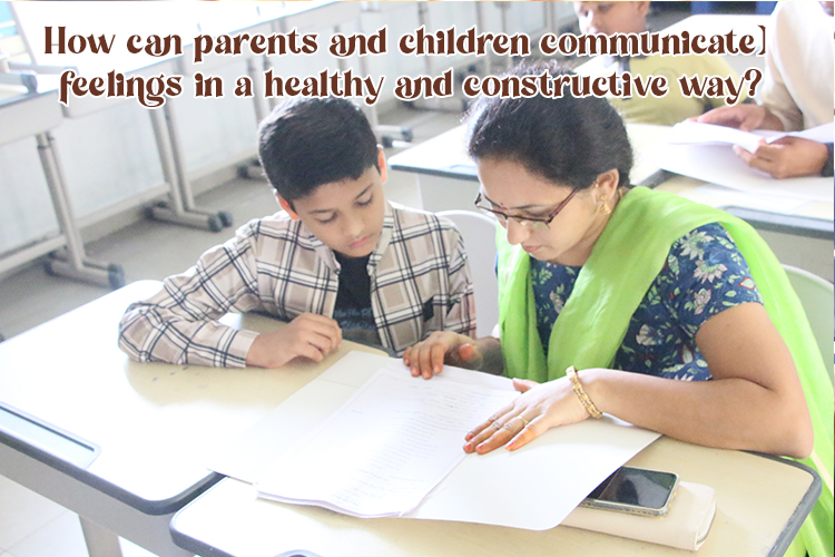 A teacher and a child looking at a piece of paper, communicating with each other