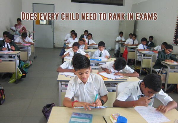 A group of students in a classroom giving exams