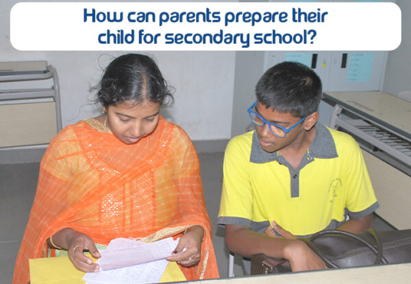 At DPS Warangal, a parent and child looking at papers related to secondary school.