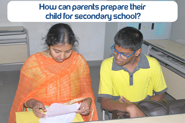 At DPS Warangal, a parent and child looking at papers related to secondary school.