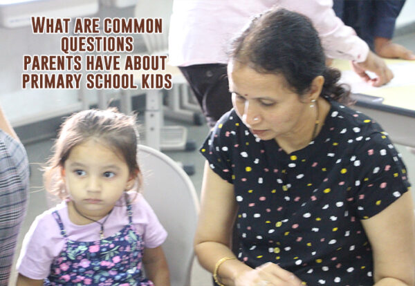 A person and a child sitting in a chair asking some common questions