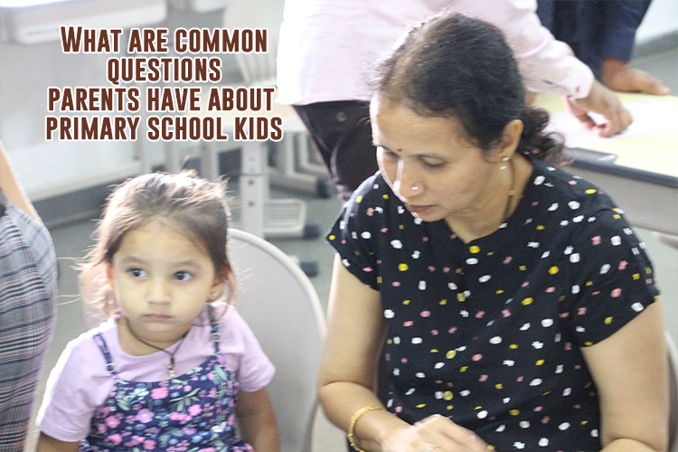 A person and a child sitting in a chair asking some common questions