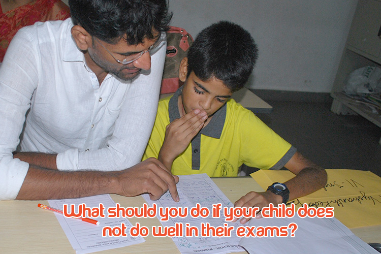 A DPS Warangal parent and child looking at a exam paper