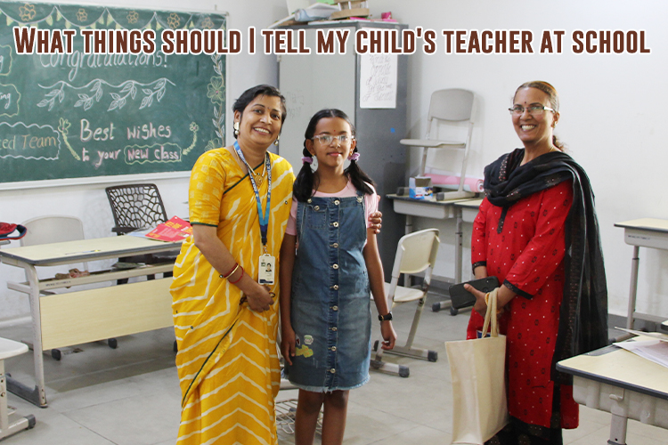 A teacher and parent with child in a classroom