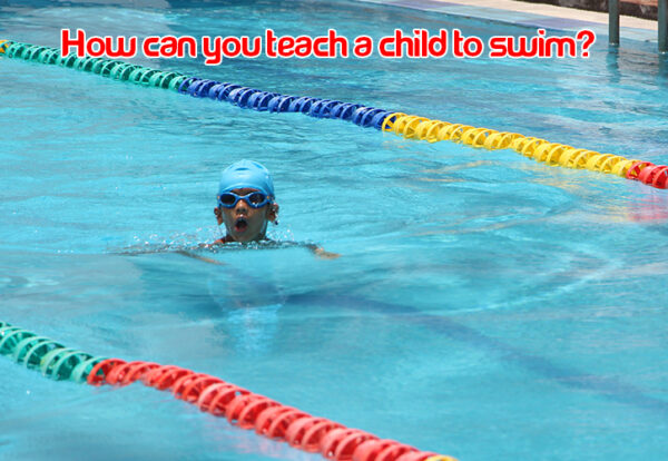 A child swimming in the pool of Delhi Public School DPS Warangal.