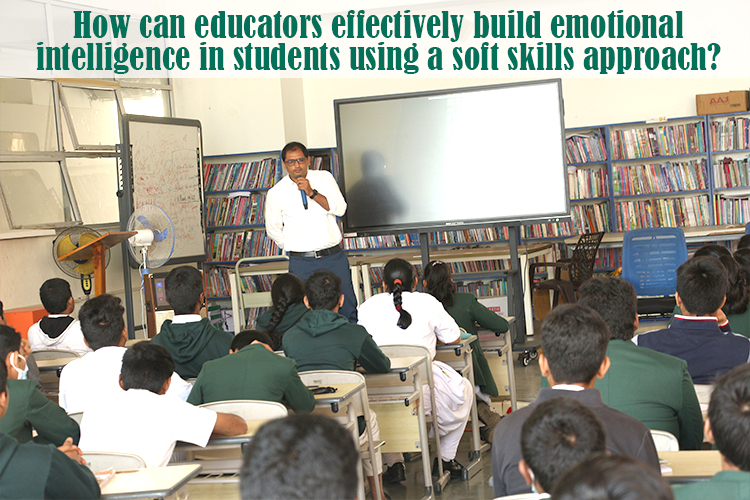 A person standing in front of a classroom teaching emotional intelligence to students.