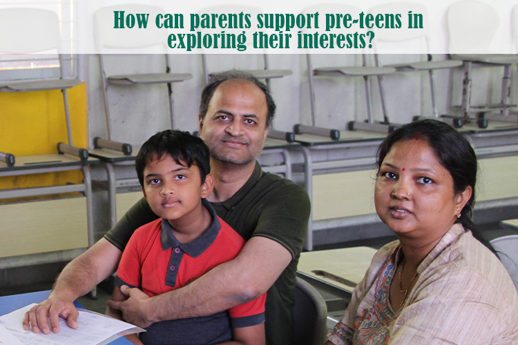 A Delhi Public School DPS Warangal parent and a child sitting at a desk exploring their child interests.