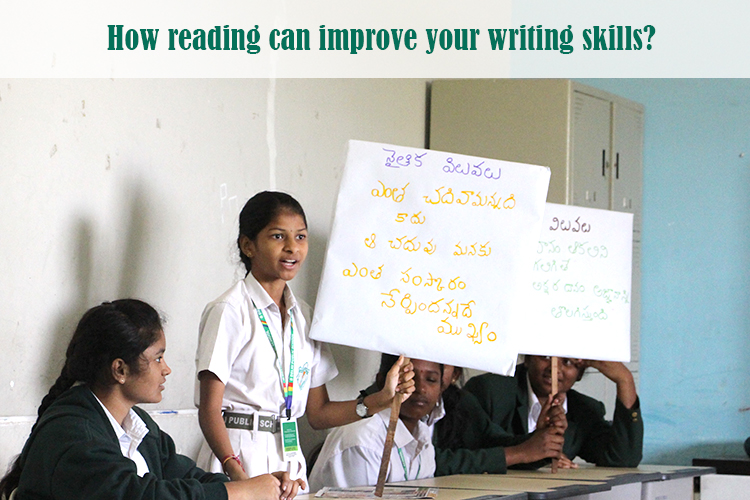 A group of students holding signs to showcase their writing skills.