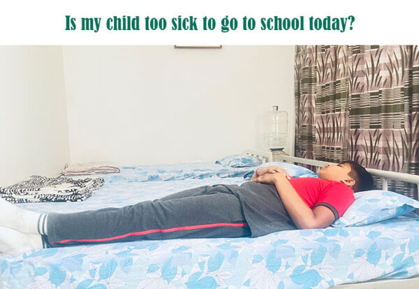 A sick child lying on a bed