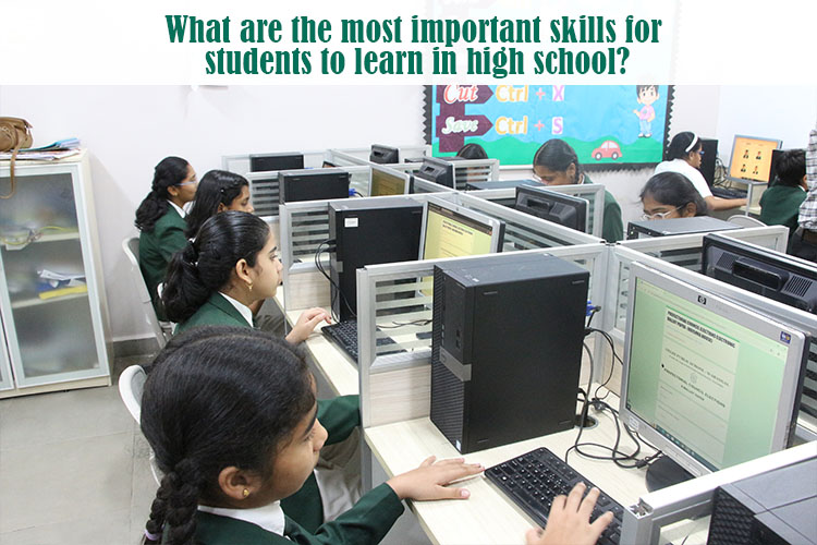 Several children in a classroom using computers to learn important skills for students.