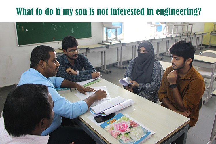 A group of people sitting at a table discussing about their son engineering career