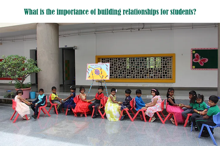 Students smiling and talking together, building relationships at school.