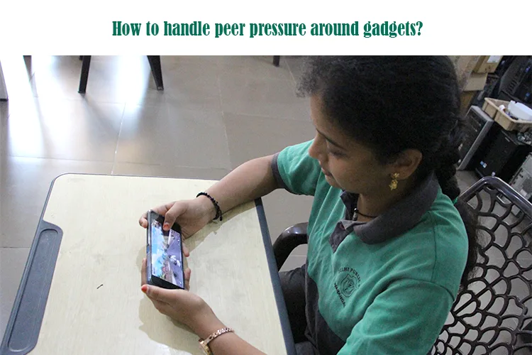 Parents guiding children to handle gadget peer pressure around gadgets.