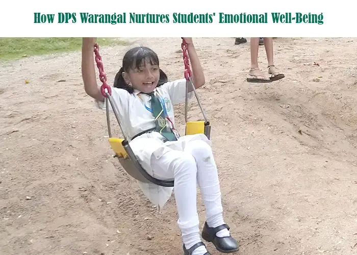 A young student happily playing on a swing during outdoor activities, reflecting how the school supports children’s emotional well-being through joyful and stress-free experiences.